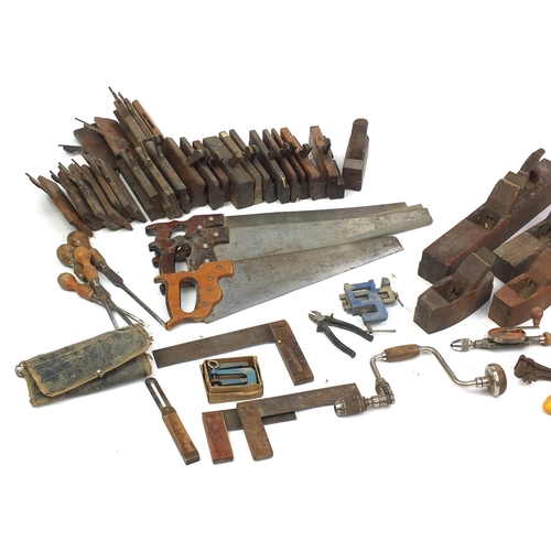 534 - Large collection of tools mostly wood working including smoothing planes, some with impressed makers... 