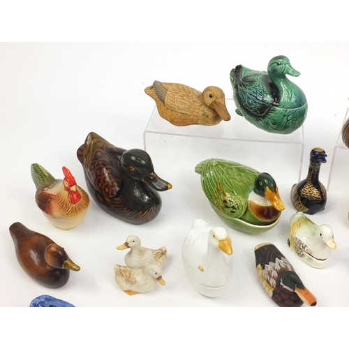 503 - Group of duck ornaments including Michael Caugant