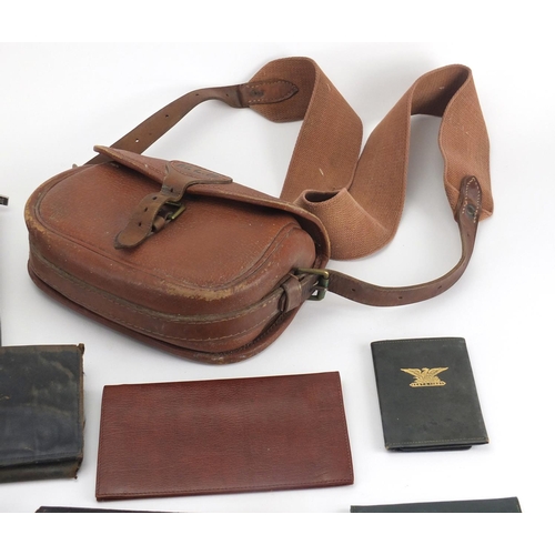 710 - Vintage leather holdall and a group of leather wallets