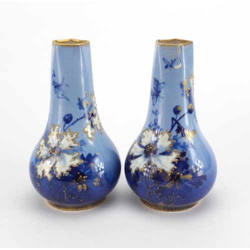 116 - Pair of Vienna porcelain vases with hand gilded decoration, 19cm high