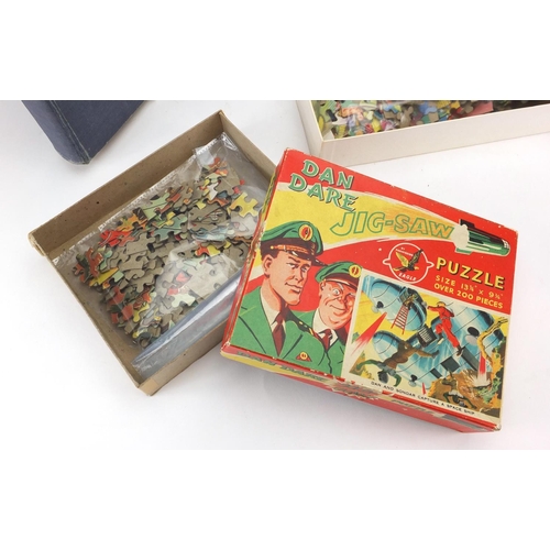 415 - Dan Dare, The Eagle Volume I and two jigsaw puzzles