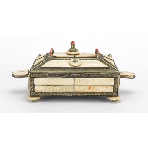 334 - Middle Eastern camel bone jewel box, the hinged lid with coral mounts, 15cm wide