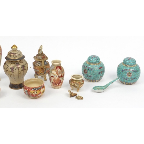 426 - Group of Oriental items including Satsuma vases, ginger jars with covers and a Satsuma plate