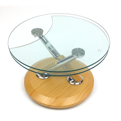 2013 - Stylish chrome and light wood, glass topped coffee table with revolving top, 44.5cm high