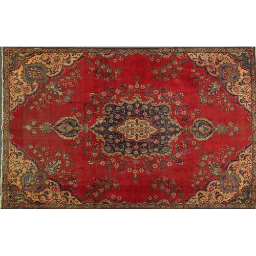 2024 - Rectangular Persian Hamadan rug, having an all over floral design onto a red ground, 320cm x 215cm