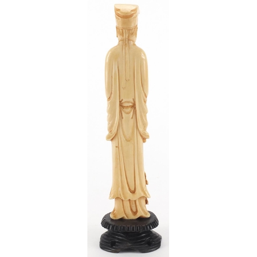 2301 - Chinese carved ivory okimono of a gentleman holding a scroll, on hardwood stand, 22cm high