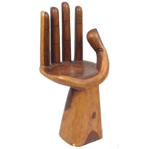 2011 - Carved wood chair in the form of a hand, 100cm high