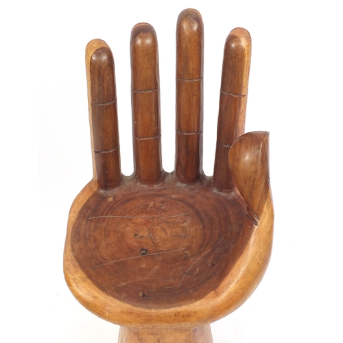 2011 - Carved wood chair in the form of a hand, 100cm high