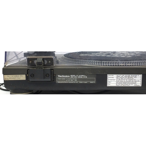 2056 - Pair of Technics Quartz turntable systems and stereo sound mixer, the turntables models SL-1210MK2 t... 