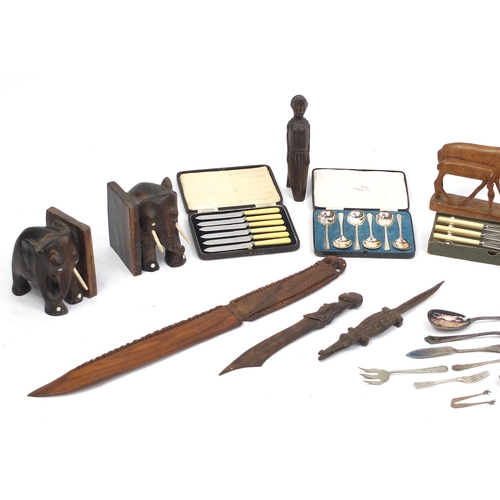 514 - Group of African carved wood animals, silver plated flatware, some in cases