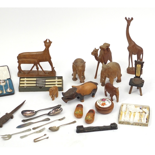 514 - Group of African carved wood animals, silver plated flatware, some in cases