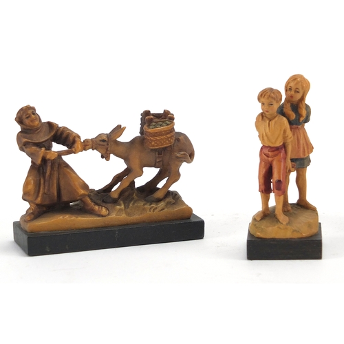 440 - Four Anri collectable figures and an Victorian lacquered pen box