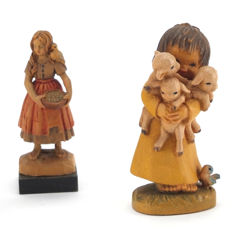 440 - Four Anri collectable figures and an Victorian lacquered pen box