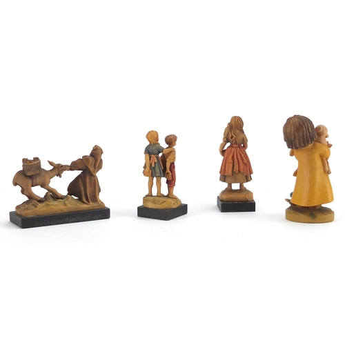 440 - Four Anri collectable figures and an Victorian lacquered pen box