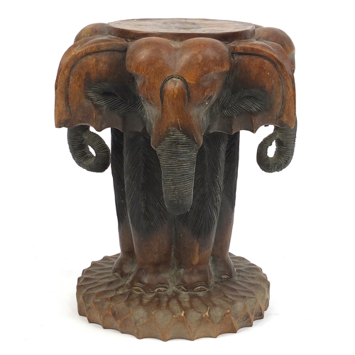 62 - Carved wooden elephant stool, 52cm high