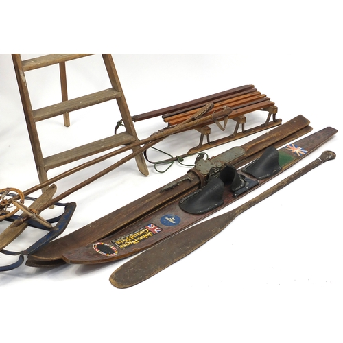 91 - Vintage items including a Tri-ang scooter, mannequin, wooden ski's, sledge and a wooden step ladder