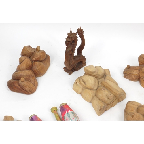 495 - Group of wood carvings including dragons and lizards