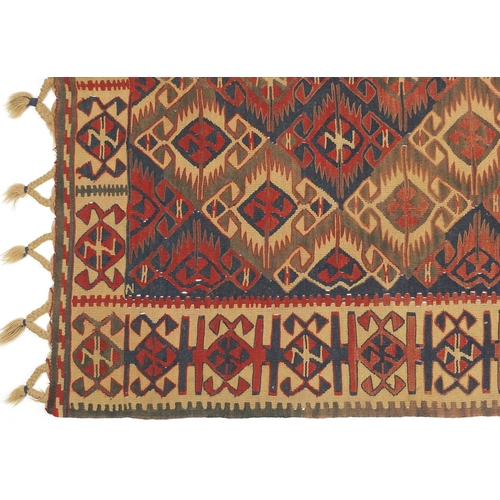 2010 - Rectangular Turkish Kilim rug having an all over geometric design, predominantly in blues and reds, ... 