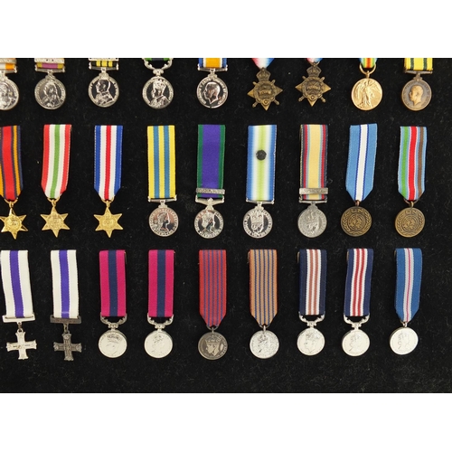 2069 - British Gallantry and Campaign medals by The Danbury Mint, serial number 1193, overall 65cm x 50cm