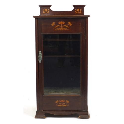 23 - Art Nouveau inlaid mahogany music cupboard, with glazed door inlaid with stylised flowers, 100cm H x... 