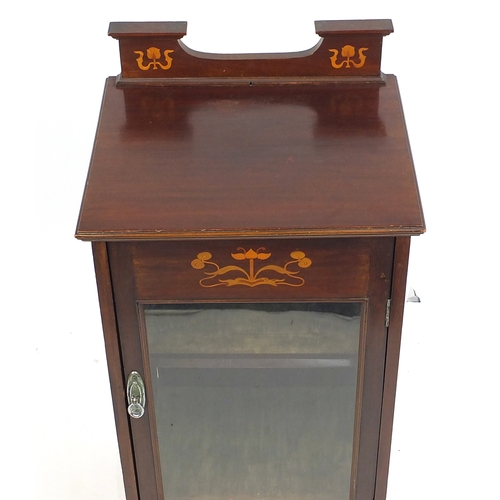 23 - Art Nouveau inlaid mahogany music cupboard, with glazed door inlaid with stylised flowers, 100cm H x... 