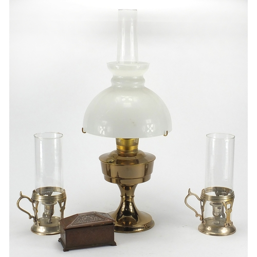 126 - Aladdin 23 oil lamp. pair of chamber sticks and a coppered metal casket