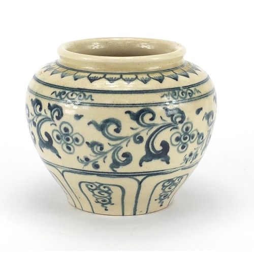 140 - Asian pottery vase with blue and white decoration, 12cm high