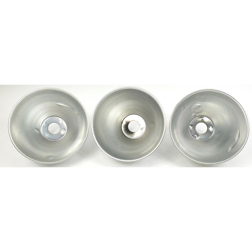 220 - Three industrial style brushed aluminium light shades, 31cm high