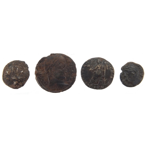 449 - Four Roman coins including three silver, approximate weight 5.7g