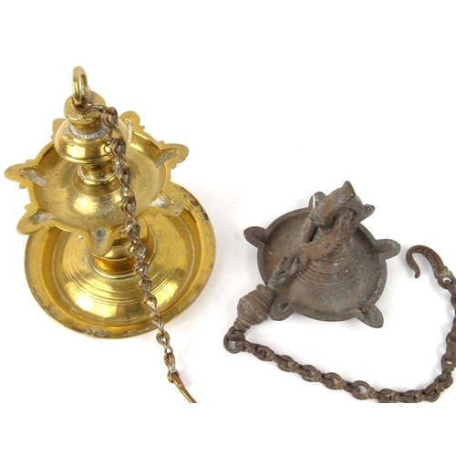 468 - Two Middle Eastern hanging brass oil lanterns , the larger 25cm high