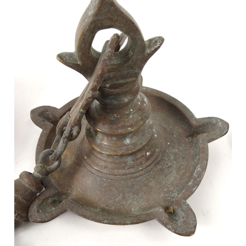 468 - Two Middle Eastern hanging brass oil lanterns , the larger 25cm high