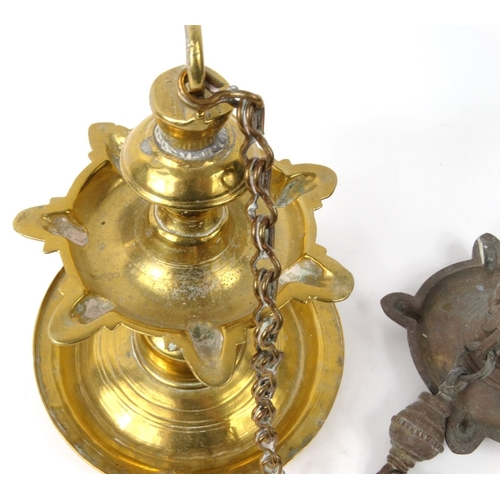 468 - Two Middle Eastern hanging brass oil lanterns , the larger 25cm high