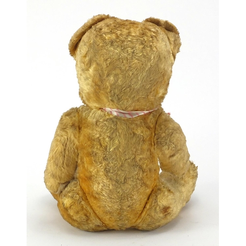 477 - Golden straw filled teddy bear with jointed limbs, 47cm high