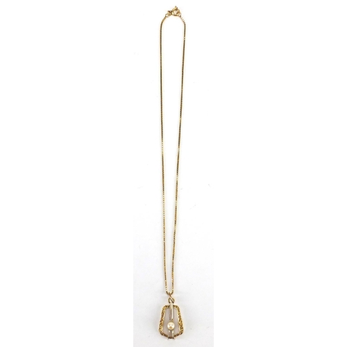 252 - Gold coloured metal and pearl pendant on a gold coloured metal necklace