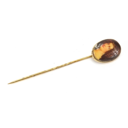 283 - 9ct gold and porcelain portrait tie pin, 7cm in length