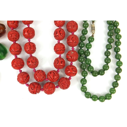 287 - Collection of beaded necklaces including an Oriental lacquered example, jadeite examples etc