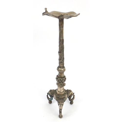 551 - Oriental Chinese silver metal candlestick, decorated with dragons, character mark to base, 40cm high