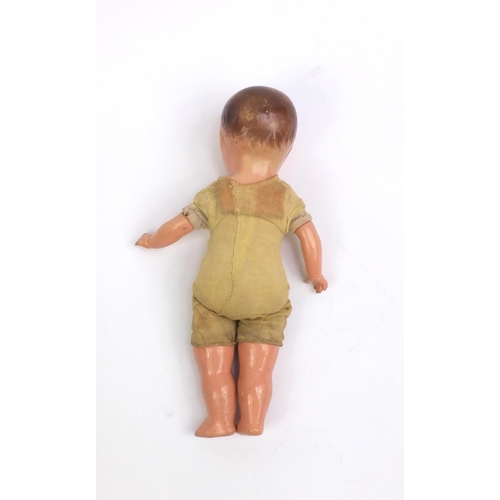 554 - Vintage composite doll, marked A Reliable Doll to the back, 37cm high