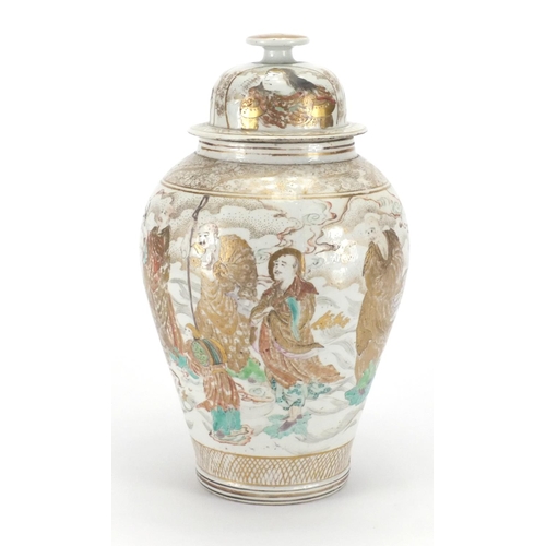 568 - Japanese porcelain jar and cover, hand painted and gilded with immortals, dragons and birds of parad... 