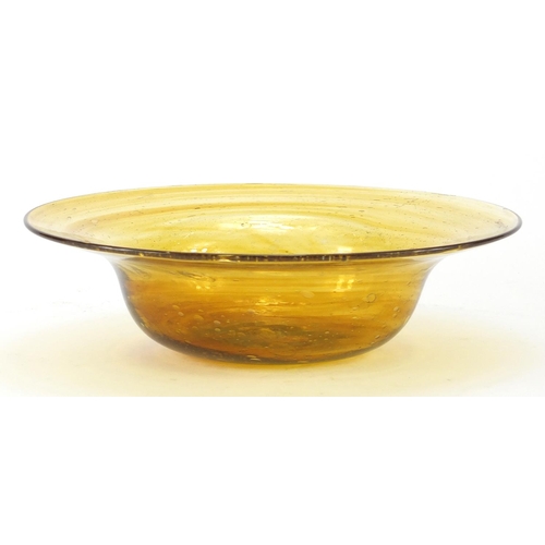 574 - Amber coloured art glass bowl, 26cm in diameter