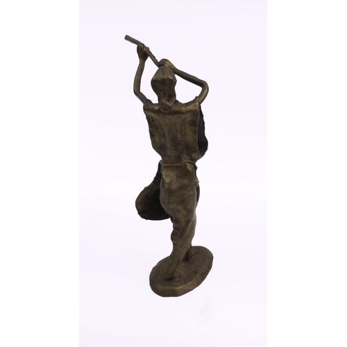 588 - Middle Eastern bronze figure playing a musical instrument, 30cm high