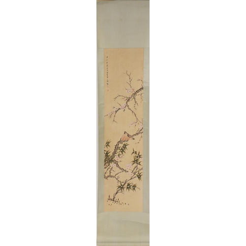 593 - Chinese scroll decorated with a central view of birds amongst flowering branches, signed with seal a... 