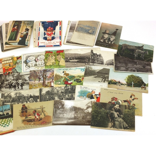 623 - Mostly topographical social history and comical postcards including Donald McGill and street scenes