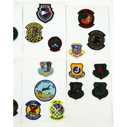 645 - Eight Military interest cards of USAF fighter pilot squadron patches including F16 and shield exampl... 