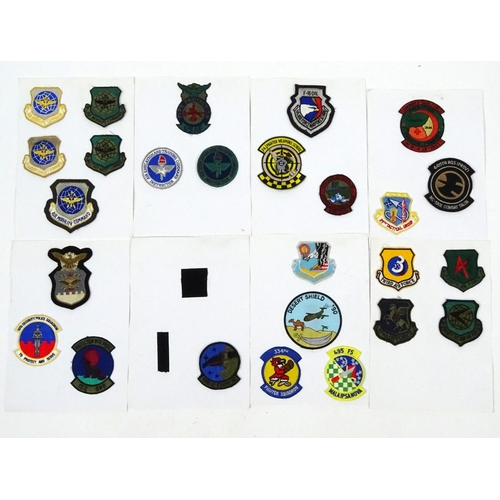 645 - Eight Military interest cards of USAF fighter pilot squadron patches including F16 and shield exampl... 