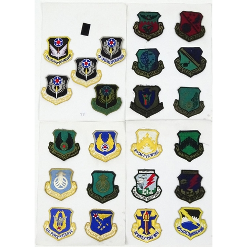 646 - Four cards of US air force regiment patches including special forces and air lift examples