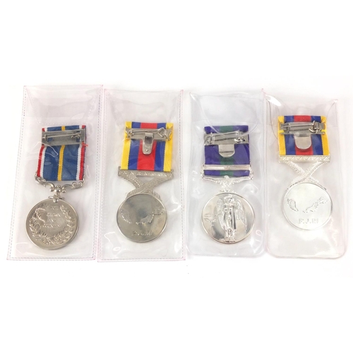 647 - Four Military interest reproduction medals