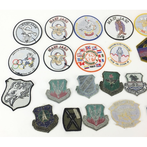 648 - German Military interest style cloth patches including Soviet and Cold War examples