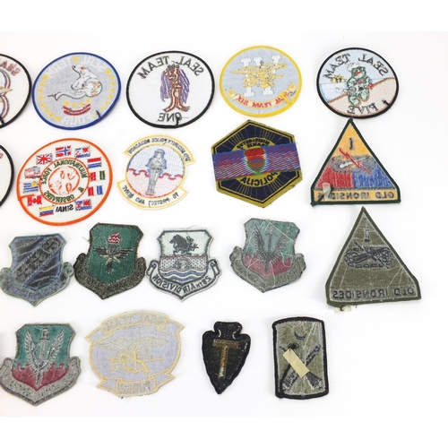 648 - German Military interest style cloth patches including Soviet and Cold War examples