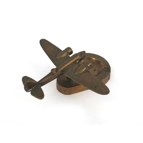 649 - Brass Military interest aeroplane ashtray, 16.5cm long